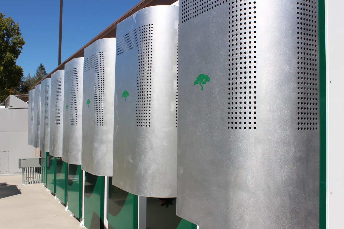 A bank of lithium ion batteries, installed by Green Charge Networks, feeds power into a Bay Area high school, shaving down its peak demand from PG&E. The Poway Unified School District plans to install similar banks – most of them 250 kilowatts – at 10 schools in early 2016. Photo courtesy of Green Charge Networks
