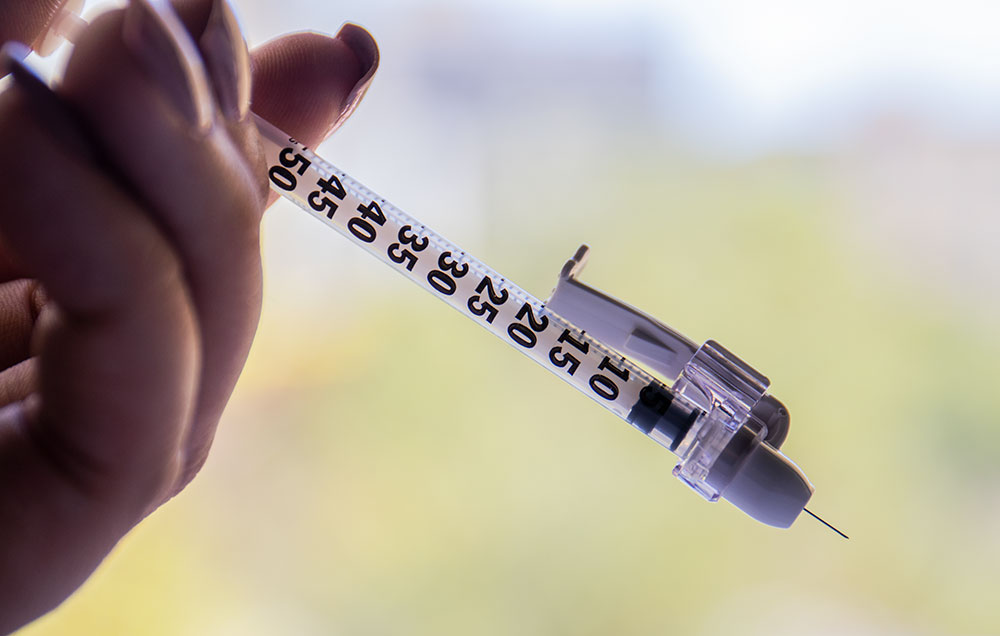Photo illustration of vaccination needle